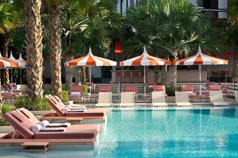 Poolside beds allow for easy lounge-to-swim access