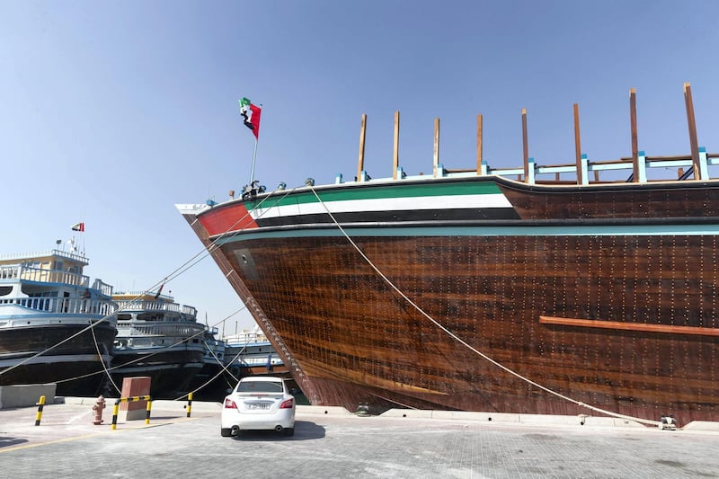 DUBAI, UNITED ARAB EMIRATES. 28 JANUARY 2021. The Obaid, officially the worlds biggest Arabic Wooden Dhow as awarded by the Guiness Book of Records loading cargo bound for Yemen in Dubai port after returning from her maiden voyage also to Yemen to deliver 600+ cars. (Photo: Antonie Robertson/The National) Journalist: Kelly Clarke. Section: National.