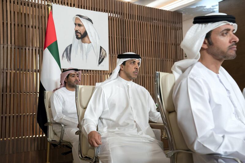 ABU DHABI, UNITED ARAB EMIRATES - March 16, 2020: HH Sheikh Hazza bin Zayed Al Nahyan, Vice Chairman of the Abu Dhabi Executive Council (R), HH Sheikh Mansour bin Zayed Al Nahyan, UAE Deputy Prime Minister and Minister of Presidential Affairs (C) and HE Ali Saeed Al Neyadi, President and Commissioner of the Customs and Authority (L), receive a briefing via video conference call from the Covid19 working group in the HQ of the National Emergency Crisis and Disasters Management Authority (NCEMA) (not shown). 

( Mohamed Al Hammadi / Ministry of Presidential Affairs )
---