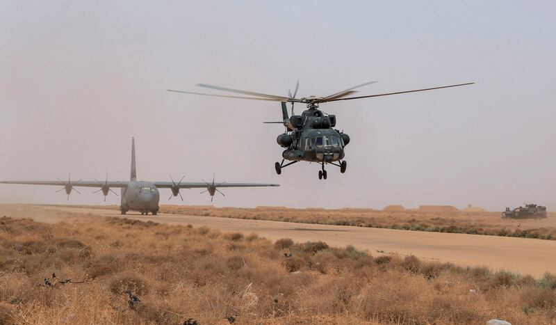An Iraqi Army helicopter during the "Solid Will" military operation against ISIS militants in the desert of Anbar, Iraq.