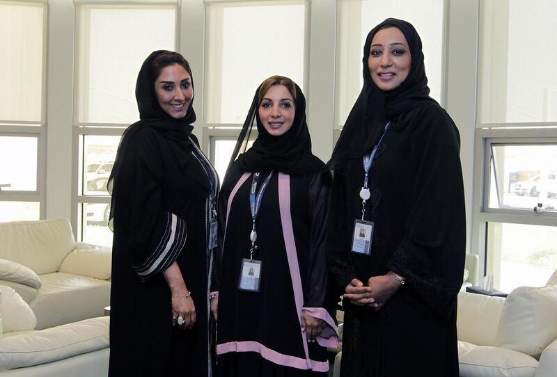 Abu Dhabi Airports Company colleagues, from left,  Arwa bin Haider, Iman Marzouqi and Mona Al Ghanim have blazed a trail for women in the UAE’s aviation sector, bringing their expertise and raising the bar for Emiratis in business and commerce. Jeffrey E Biteng / The National