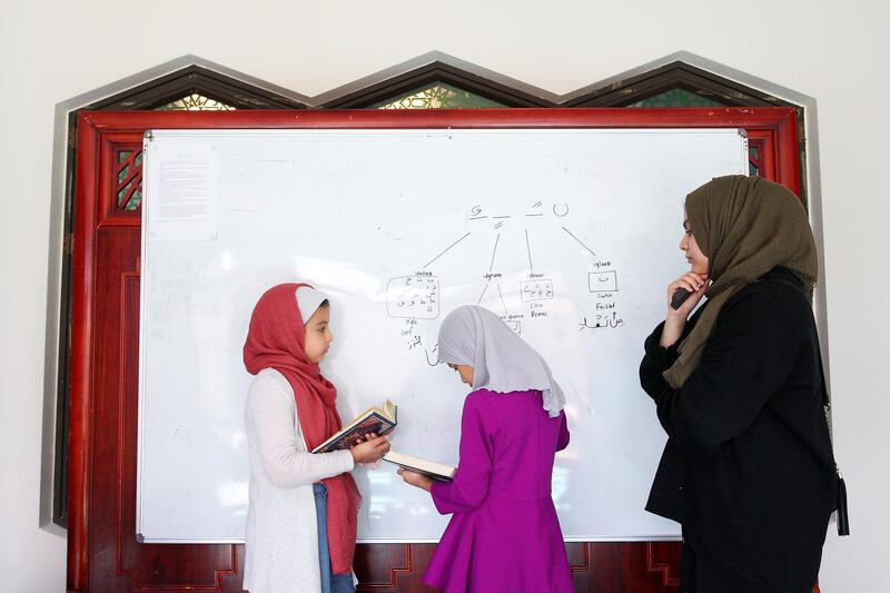 CHRISTCHURCH, NEW ZEALAND - AUGUST 24: Young students learn Arabic and read the Quran during weekend teachings at the Al Noor Mosque on August 24, 2019 in Christchurch, New Zealand. The Christchurch Islamic community  continue to receive international visitors and letters of support. 51 people were killed and dozens were injured following the worst mass shooting in New Zealandâ€™s history after a man opened fire at Al Noor Mosque and the Linwood Islamic Centre in Christchurch on 15 March 2019. The Australian gunman is now facing 51 charges of murder and 40 of attempted murder as well as engaging in a Terrorist Act and is due to go on trial in May 2020. (Photo by Lisa Maree Williams/Getty Images)