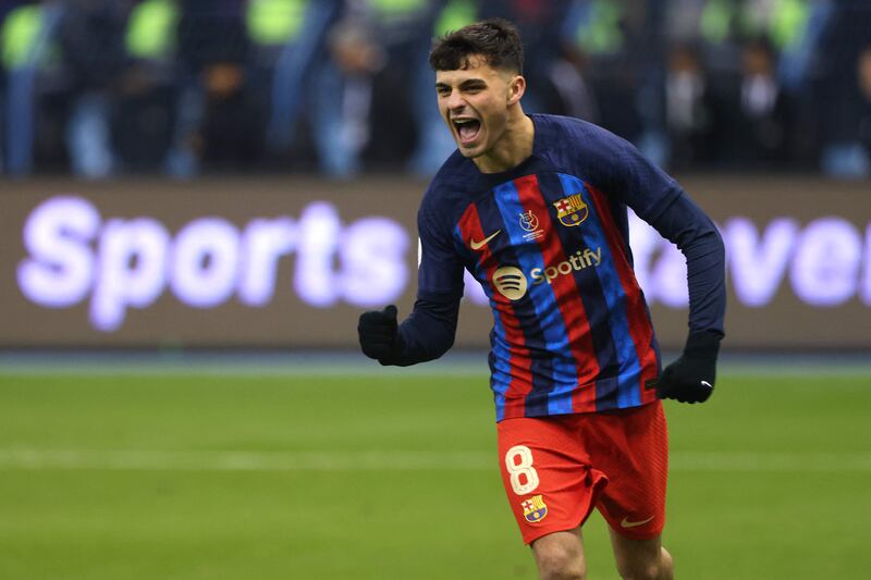 Barcelona midfielder Pedri celebrates scoring the winning penalty in the Spanish Super Cup semi-final shootout victory against Real Betis at the King Fahd International Stadium in Riyadh, Saudi Arabia, on January 12, 2023. AFP