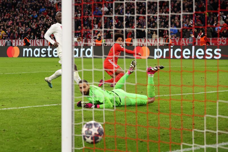 PSG goalkeeper Gianluigi Donnarumma watches Serge Gnabry's shot hit the back of the net to make 2-0 to Bayern. Getty