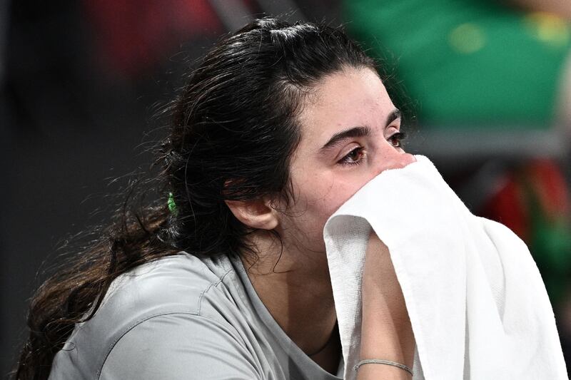 Syria's Hend Zaza after being defeated by Austria's Liu Jia.