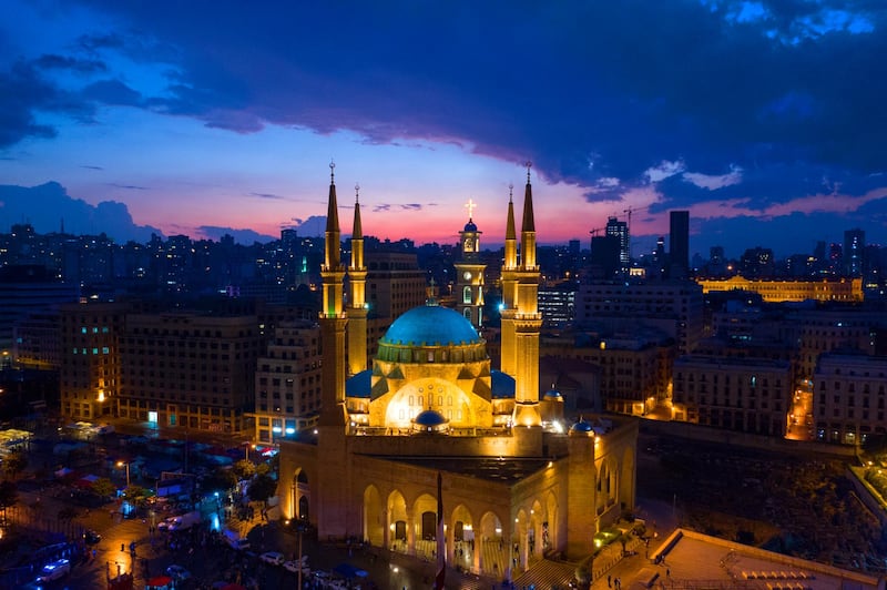 epaselect epa07956636 A picture taken with a drone shows an aerial view shows Muhammad al-Amin Mosque during sunset in downtown Beirut, Lebanon, 28 October 2019. Thousands continued to protest on the second week of demonstrations against proposals of tax hikes and state corruption, and calling for the resignation of the government.  EPA-EFE/WAEL HAMZEH *** Local Caption *** 55585657