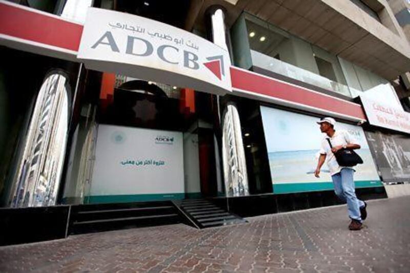 Abu Dhabi Commercial Bank was the best-performing stock last month, rising by 13 per cent, after the lender started a share buyback programme. Fatima Al Marzooqi/ The National