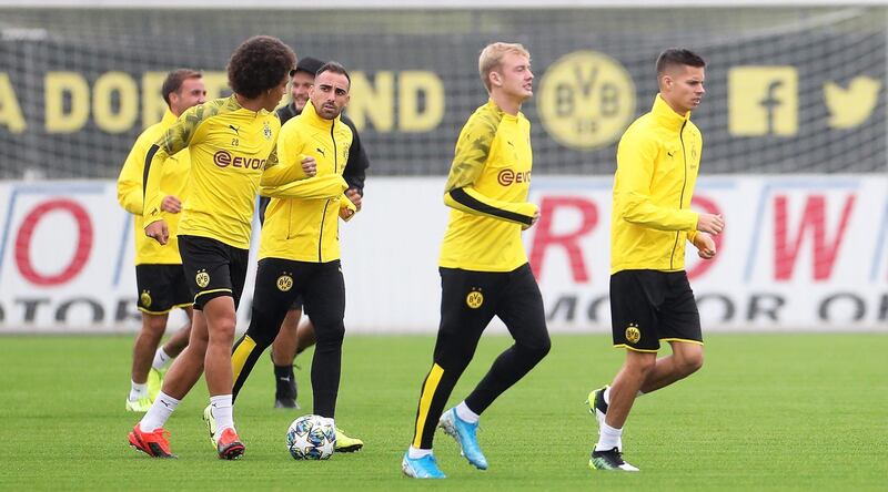 Dortmund players Axel Witsel, Paco Alcacer, Julian Brandt, and Julian Weigl attend their team's training session. AFP