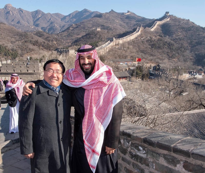Saudi Crown Prince Mohammad Bin Salman poses for a photo with the Chinese Ambassador to Saudi Arabia at the Great Wall of China. EPA