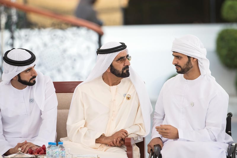 ABU DHABI, UNITED ARAB EMIRATES - February 19, 2018: HH Sheikh Hamdan bin Mohamed Al Maktoum, Crown Prince of Dubai (L), and HH Sheikh Mohamed bin Rashid Al Maktoum, Vice-President, Prime Minister of the UAE, Ruler of Dubai and Minister of Defence (C), speak with HH Sheikh Zayed bin Hamdan bin Zayed Al Nahyan (R), during a Sea Palace barza. 
( Ryan Carter for the Crown Prince Court - Abu Dhabi )
---