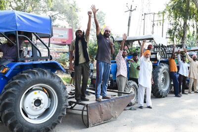 Farmers block a road during a nationwide strike against the central government's agricultural reforms. AFP