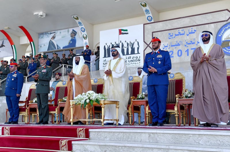 Sheikh Mohammed bin Rashid, Vice President, Ruler of Dubai and Minister of Defence; Sheikh Tahnoun bin Mohammed, Abu Dhabi Ruler's Representative in the Al Ain Region;  Mohammed Al Bowardi, Minister of State for Defence Affairs, and Lt Gen Hamad Al Rumaithi, chief of staff of the Armed Forces, attend the graduation ceremony of Air Cadet and Cadet Pilot officers at Khalifa bin Zayed Air College in Al Ain on Monday. Wam