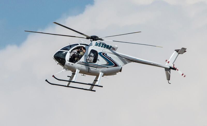 An authorities chopper flies over an area in Odessa, Texas after reports of gunfire. Police said there are "multiple gunshot victims" in West Texas after reports of gunfire on Saturday in the area of Midland and Odessa. AP