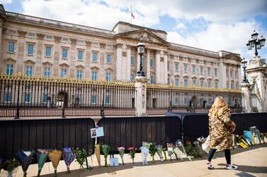 Floral tributes outside London's Buckingham Palace to the UK's Prince Philip, who died aged 99. Getty.