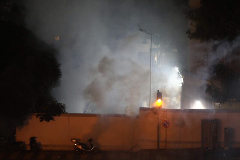 Tear gas smoke rises from the Russian embassy, fired by riot police, during clashes between riot police and Lebanese anti-government protesters, near the embassy in Beirut. AFP
