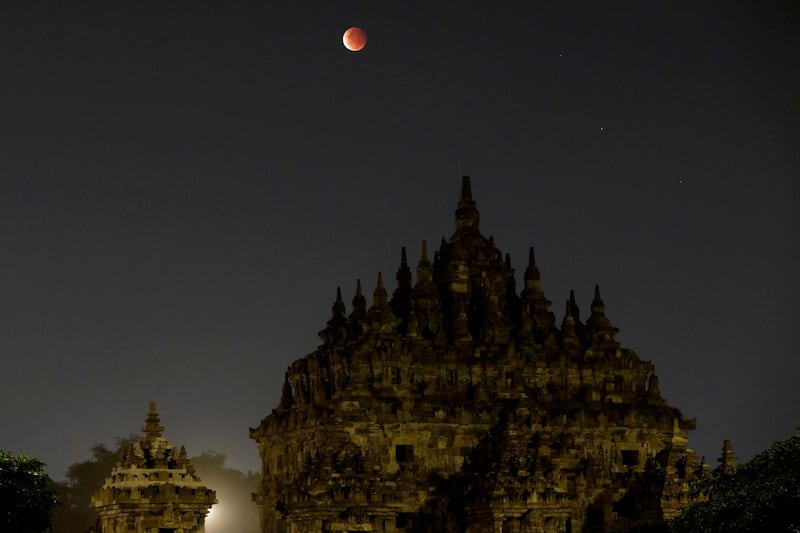 The Super Flower Blood Moon rises over the Buddhist Plaosan temple in Klaten regency, Central Java province, Indonesia. It is estimated that the temple was built in the 9th century. Reuters