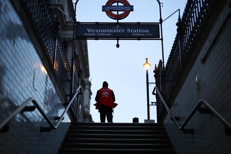 A man hands out Evening Standard newspapers near Westminster Underground Station in London, UK on March 20, 2020 as the city is shutdown in the wake of the coronavirus pandemic, on March 20, 2020. Bloomberg
