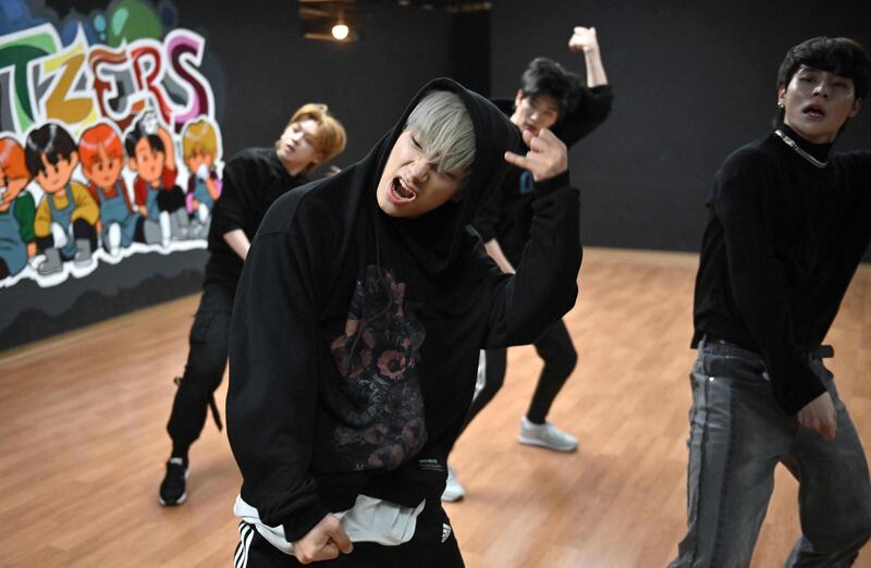 Blitzers perform during their dance practise session at a rehearsal studio in Seoul. AFP