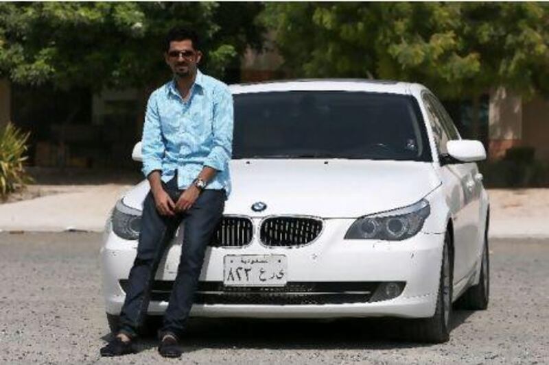 Fahad al Abdullatif with his 2008 BMW 523 at Knowledge Village in Dubai. Pawan Singh / The National