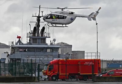 A French rescue helicopter lands close to a rescue vessel in Dunkirk, northern France, Tuesday, Oct. 27, 2020 during aÂ Â search operation after four migrants, including a 5-year-old and 8-year-old child died Tuesday when their boat capsized while they and other migrants tried to cross the English Channel to Britain, French authorities said. Fifteen migrants have been saved so far and rescue and search operations are still under way, according to the regional administration for the Nord region. (AP Photo)