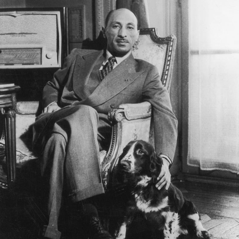 circa 1960:  King Mohamed Zaher Shah of Afghanistan relaxing with his dog.  (Photo by Keystone/Getty Images)