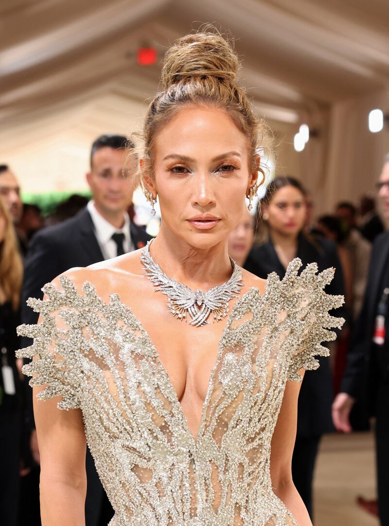 Jennifer Lopez in Tiffany & Co earrings and necklace, and a custom-made Schiaparelli gown. Reuters