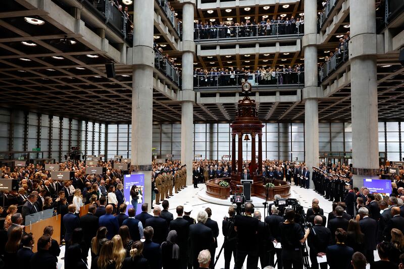 Lloyd's of London chief John Neal delivers remarks honouring the life of Queen Elizabeth during a remembrance ceremony in the atrium of the company's offices in London. Getty Images