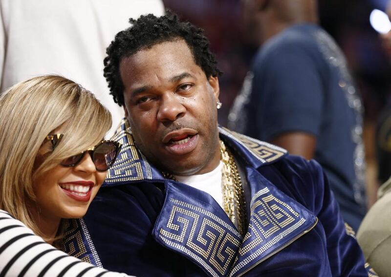 Rapper Busta Rhymes, right, watches the 63rd NBA All-Star Game. Paul Buck / EPA