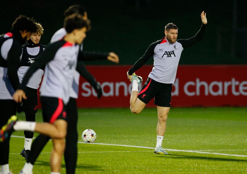 Liverpool's James Milner stretches. Reuters 