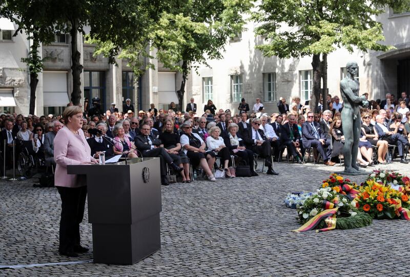 epa07729224 German Chancellor Angela Merkel speaks during a commemoration service for the 75th anniversary of the attempted assassination of Adolf Hitler by the German anti-Nazi resistance, at the Bendlerblock in Berlin, Germany, 20 July 2019. The anniversary commemorates the members of the resistance, led by Claus von Stauffenberg, who were arrested and executed after a failed assassination attempt on Adolf Hitler that took place on 20 July 1944. Von Stauffenberg was executed in the Bendlerblock courtyard.  EPA/FELIPE TRUEBA