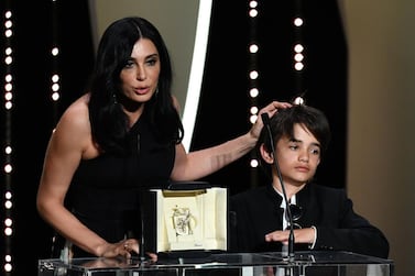 Nadine Labaki with Zain Al Rafeea at the Cannes Film Festival. Photo / AFP 