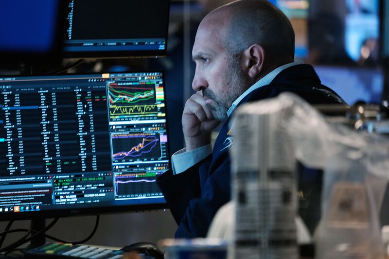 Traders work on the floor of the New York Stock Exchange. Oil market participants will be keenly following the Group of Seven's implementation of a price cap on Russian oil. AFP