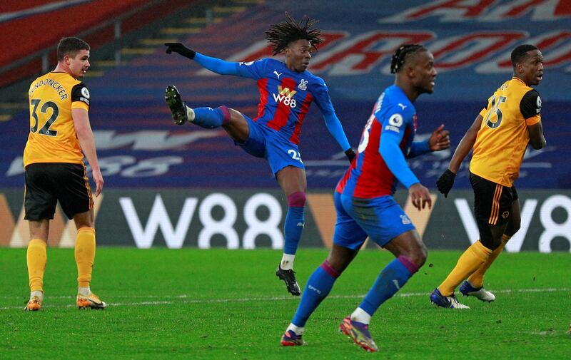 Crystal Palace's English midfielder Eberechi Eze (C) scores the opening goal during the English Premier League football match between Crystal Palace and Wolverhampton Wanderers at Selhurst Park in south London on January 30, 2021. (Photo by Ian Walton / POOL / AFP) / RESTRICTED TO EDITORIAL USE. No use with unauthorized audio, video, data, fixture lists, club/league logos or 'live' services. Online in-match use limited to 120 images. An additional 40 images may be used in extra time. No video emulation. Social media in-match use limited to 120 images. An additional 40 images may be used in extra time. No use in betting publications, games or single club/league/player publications. / 