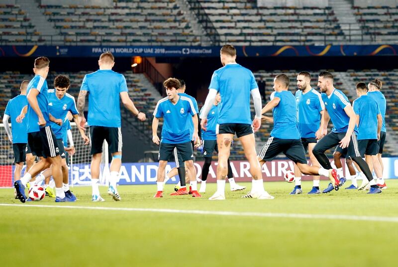 Real Madrid's players attend a training session at Zayed Sports City stadium in Abu Dhabi. EPA