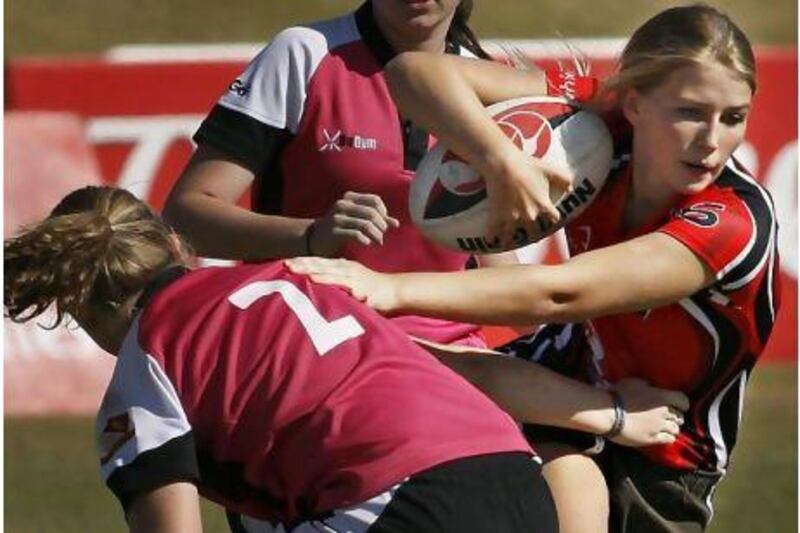Rae Chase, right, comes from a lineage of rugby-playing family and the 16-year-old scrum-half is the captain of the Sharjah Wanderers Under 18 team.