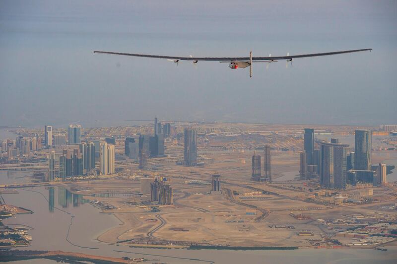 epa04638110 A handout photo made available by the Solar Impulse showing the Solar Impulse 2 during the first test flight in Abu Dhabi, UAE, 26 February 2015. Solar Impulse 2 successfully accomplished the first test flight since the reassembly with the test pilot Markus Scherdel at the controls. Solar Impulse 2, the only solar single-seater airplane able to fly day and night without a drop of fuel, will attempt the First Round-The-World Solar Flight in early March 2015, departing from Abu Dhabi. Swiss founders and pilots, Bertrand Piccard and Andre Borschberg, will take turns flying Solar Impulse 2 over the Arabian Sea, to India, Myanmar, China, then across the Pacific Ocean, to the United States, and over the Atlantic Ocean to Southern Europe or Northern Africa before finishing the journey by returning to the initial departure point.  EPA/JEAN REVILLARD / SOLAR IMPULSE/HAND  HANDOUT EDITORIAL USE ONLY/NO SALES *** Local Caption ***  04638110.jpg 04638110.jpg