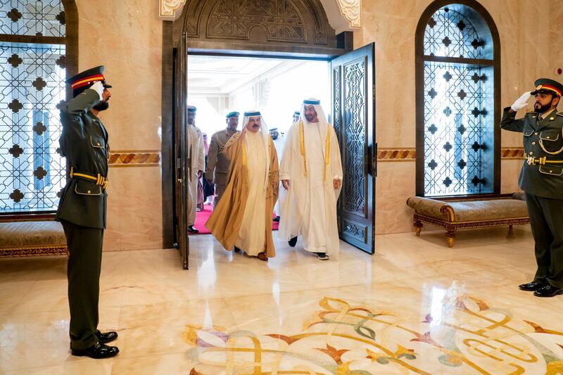 ABU DHABI, UNITED ARAB EMIRATES - May 23, 2019: HH Sheikh Mohamed bin Zayed Al Nahyan Crown Prince of Abu Dhabi Deputy Supreme Commander of the UAE Armed Forces (center R), receives HM King Hamad bin Isa Al Khalifa, King of Bahrain (center L), at Al Bateen Airport. 

( Mohamed Al Hammadi / Ministry of Presidential Affairs )
---