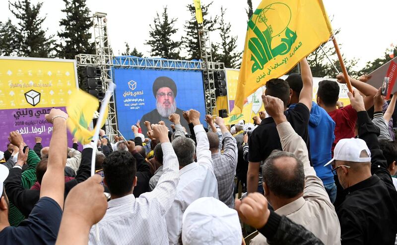 REFILE - QUALITY REPEAT Hezbollah leader Sayyed Hassan Nasrallah is seen on a screen during election rallies a few days before the general election in Baalbeck, Lebanon, May 1, 2018.   REUTERS/Hasan Abdallah