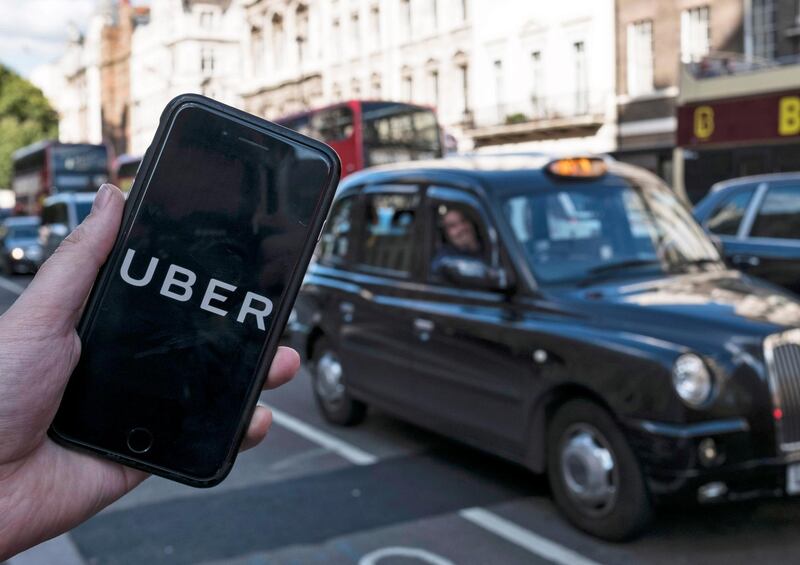 epa06842420 (FILE) - An image showing an Uber app on a mobile phone in central London, Britain, 22 September 2017 (re-issued 26 June 2018). Media reports on 26 June 2018 state the Westminster Magistrates' Court in London has ruled Uber is to receive a 15-month license for operating in London. The Transport for London refused the renewal of Uber's license in September 2017, but Uber that has 45,000 drivers working in London appealed the decision.  EPA/WILL OLIVER