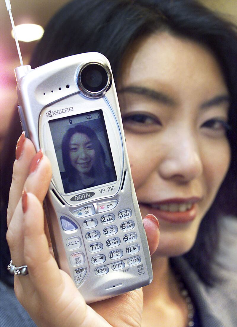 Kyocera introduced the Visual Phone VP-210 in 1999, which was able to transmit and receive colour images. Reuters