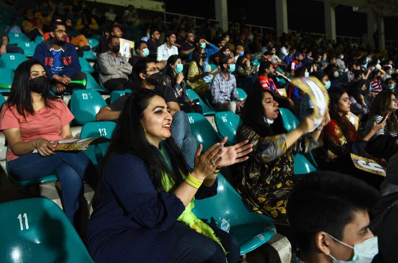 Spectators watch the Pakistan Super League match between Karachi Kings and Lahore Qalandars on Sunday. EPA