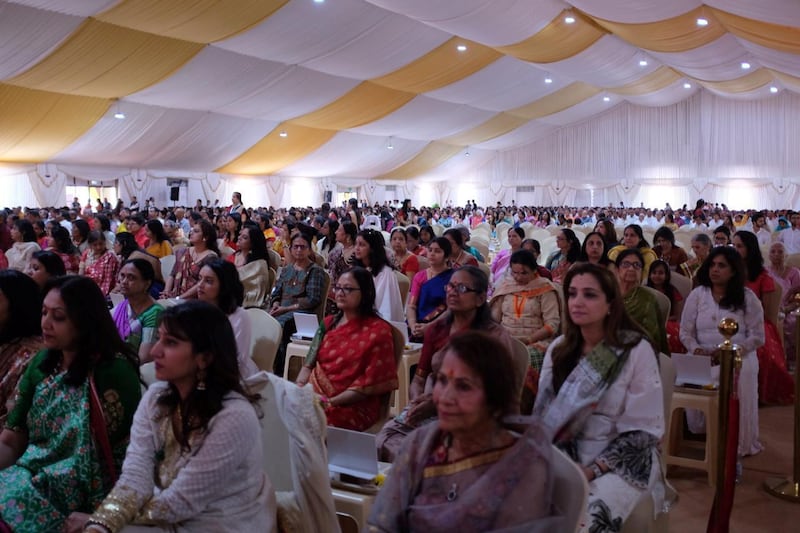 People attend the foundation stone laying ceremony.