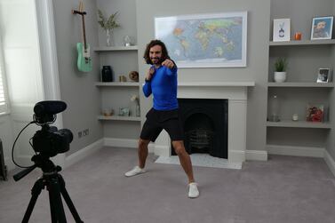 LONDON, ENGLAND - MARCH 23: Joe Wicks, aka The Body Coach, teaches the UK's school children physical education live via YouTube on March 23, 2020 from his home in London, England. Joe took to YouTube Live in response to the Covid-19 pandemic which has seen school children around the UK sent home. To keep the nations children active Joe will be teaching PE lesson's every week day from 9AM this week. (Photo by The Body Coach via Getty Images)
