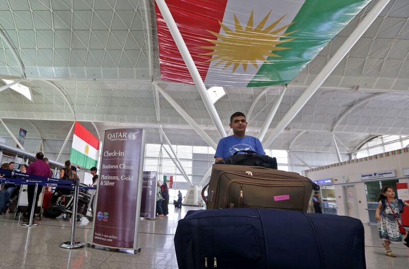Passengers are seen at Arbil airport, in the capital of Iraq's autonomous northern Kurdish region, on September 28, 2017.
All foreign flights to and from the Iraqi Kurdish capital Arbil will be suspended from Friday, officials said, as Baghdad increases pressure on the Kurds over this week's independence referendum. / AFP PHOTO / SAFIN HAMED