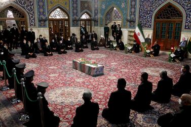 Mourners pray over the body of Mohsen Fakhirzadeh, the Iranian nuclear scientist who was assassinated on Friday. AP