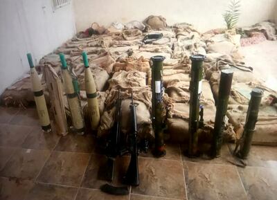 Weapons and other unidentified supplies seized by the army. Petra News Agency
