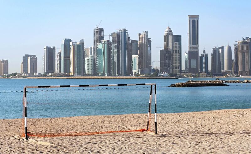 epa07655128 (FILE) - A football goal at a beach in front of the skyline of Doha, Qatar, 21 April 2015 (re-issued 18 June 2019). Former UEFA president Michel Platini has been arrested as part of an investigation in the Qatar 2022 World Cup bid, media reports claimed on 18 June 2019. Platini is believed to have been taken to the office of the Anti-Corruption Office of the Judicial Police (OCLCIFF) in Nanterre, near Paris, France.  EPA/KARL-JOSEF HILDENBRAND  GERMANY OUT *** Local Caption *** 51900240