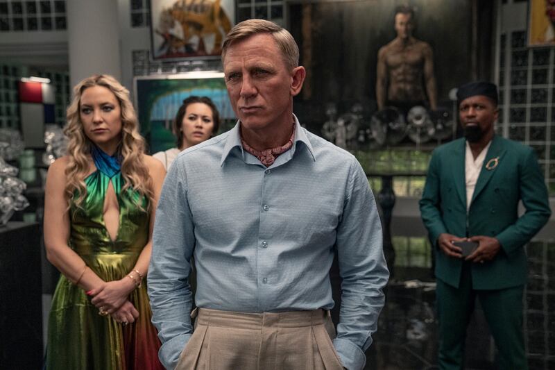 From left, Kate Hudson, Jessica Henwick, Daniel Craig and Leslie Odom Jr. in a scene from 'Glass Onion: A Knives Out Mystery'. The film was released on Netflix in December. AP