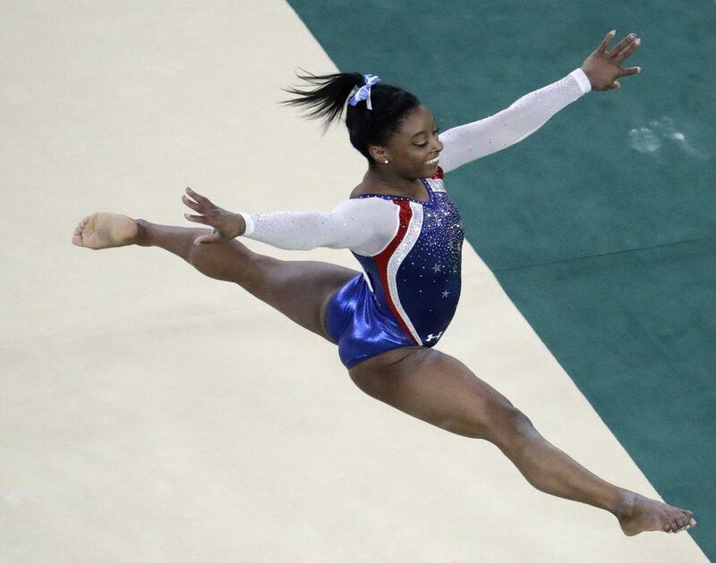 Simone Biles has won four Olympic gold medals. AP