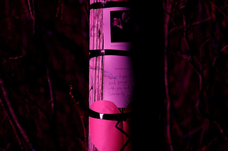 RCMP lights brighten a memorial placed earlier in the day by Dave Brown at Portapique, Nova Scotia, Canada, after a mass shooting. Reuters